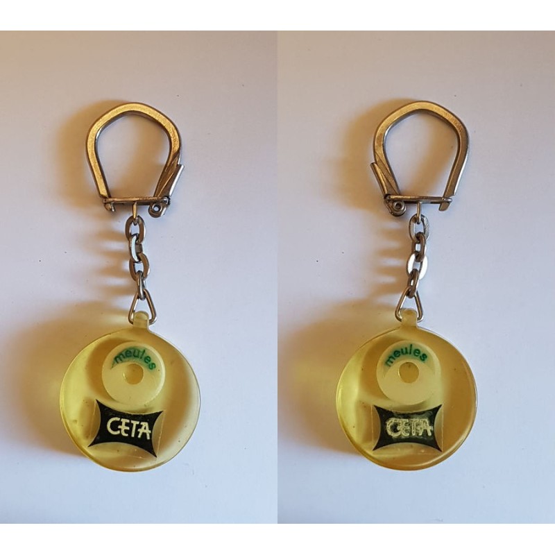 porte-clés CETA meules inclusion (pc)